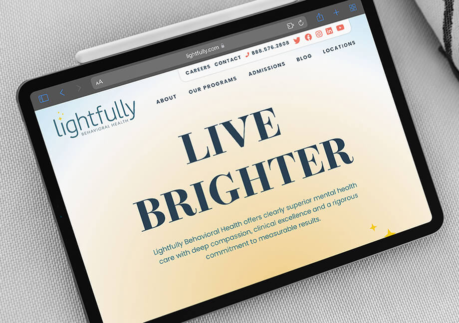 Ipad featuring the Lightfully Behavioral Health website, with brand tagline and value proposition created by Martha Chang